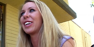 Busty Brynn Tyler masturbates in a public bathroom