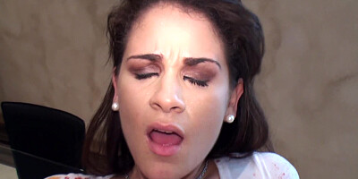 A busty bitch with a pretty face is doing a blow job to a dude