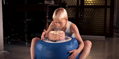 Blonde Masturbates With A Tasty Cake