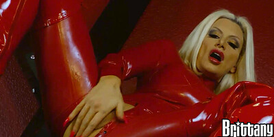 Blonde In Red Latex Suit Fingers Herself - Brittany Andrews