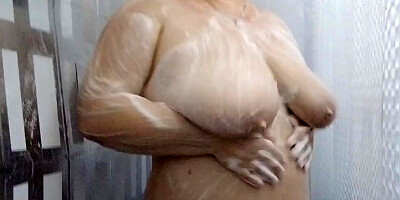 Stepmom With Big Tits And Ass Takes A Shower