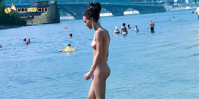 Hot nudist teen filmed by voyeur as she sits naked outside