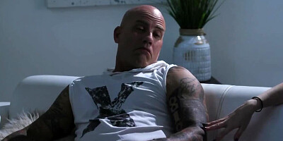 Inked man fucks a busty oiled-up masseuse on the floor