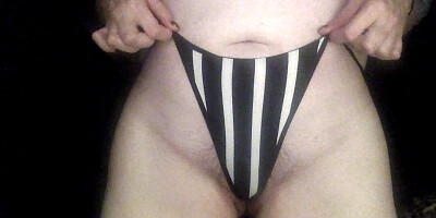 Bikini camgirl shows hairy wet pussy