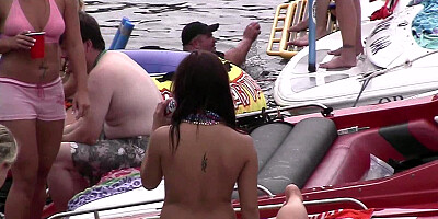 girls in bikinis and topless in public party cove