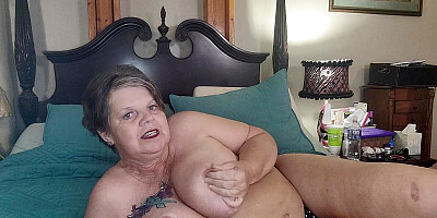 Momma Playing with Her Big Tits and Dildo