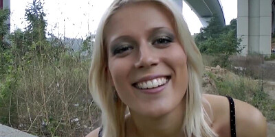 Blonde with blue eyes places her hands on a dick and she sucks it
