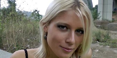 Blonde with blue eyes places her hands on a dick and she sucks it