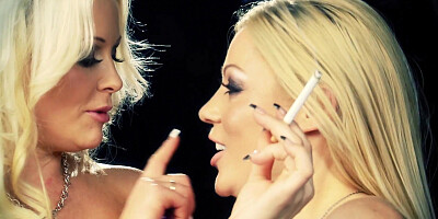 A couple of stunning blondes having a sensual smoke