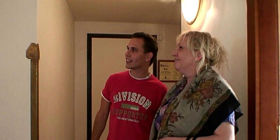 Older blonde woman is riding the huge dick of a younger man