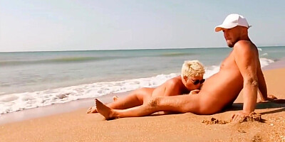 MILF Fucks With Stranger On The Beach