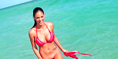 Perfect babe is getting naked at the beach