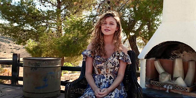 Big boobed nude blondie posed on a horse