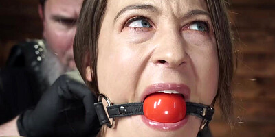 Bound on her knees and gagged and tormented