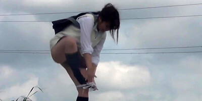 Real asian babes peeing outside