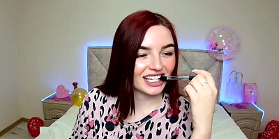 Redhead webcam girl performing