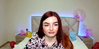 Redhead webcam girl performing