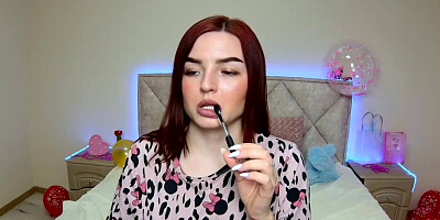 Redhead webcam girl performing