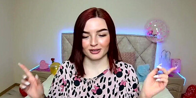 Redhead webcam girl performing