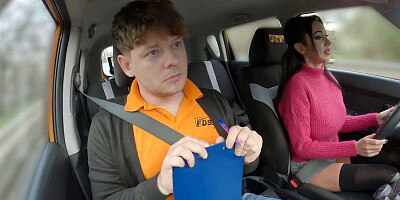 Bigtitted driving student riding cock on her first class