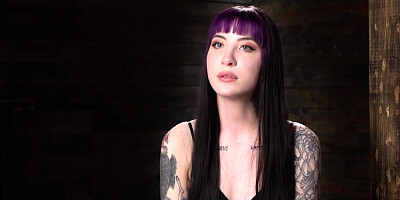 Tattooed slave suspended and flogged in dungeon