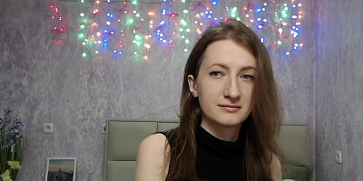 Brunette babe fondles tit on webcam