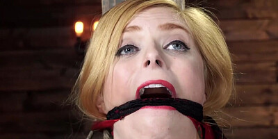Tied to a wooden column and whipped