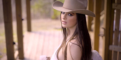 Skinny cowgirl reveals her perfect tits