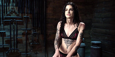 Babe bound in chains to a post