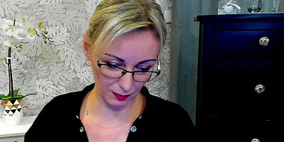 German MILF posing in mini skirt on webcam