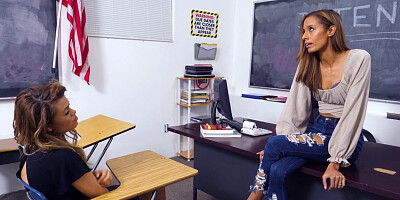Lesbian teacher scissoring with student in the classroom