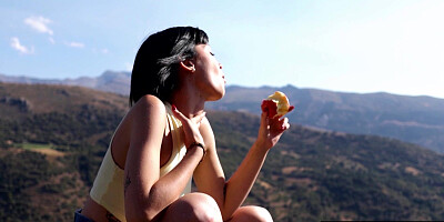 Hot muse reveals her boobs on a hilltop