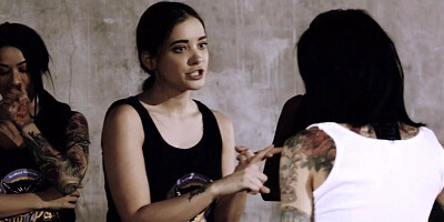 Tattooed babe licking hairy pussy