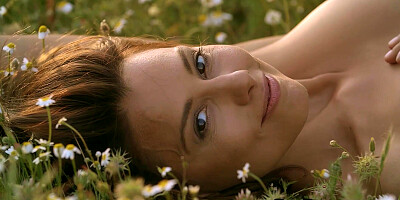 Hot medium tits babe posed in the grass
