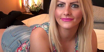 Beautiful blonde with make up posing on webcam