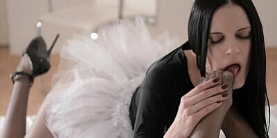 Ballerina gives strapon to her pantyhose encased sex doll