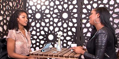 Busty ebony girls like to have gentle lesbian sex with a big blue dildo on the couch