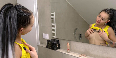 ...Petite babe Lady Zee caresses herself solo in the bathroom...