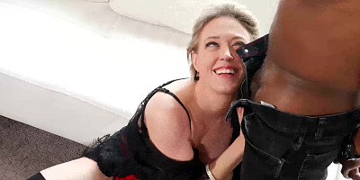 Busty blonde MILF is feasting on a girthy black cock