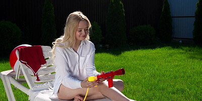 ...Lina Shisuta strips and masturbates passionately in the backyard...