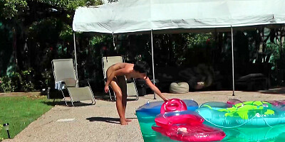 Missy Maze is lounging naked in the pool in this video