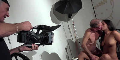 Beautiful babe doggystyle banged by grandpa in porn shooting
