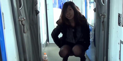 Japanese brunette [censored] close up peeing in train
