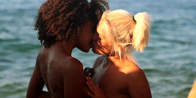 ...Luna Corazon and Cecilia Scott make love on the beach...