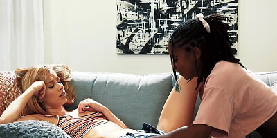 Lesbian with slender figure enjoys black lover's lips on the twat