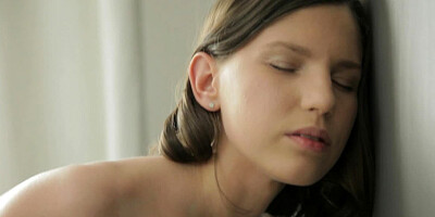 Two women are fooling around with a huge dildo in a lesbian scene