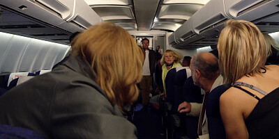 Pilot and a couple of sexy flight attendants fuck on the plane
