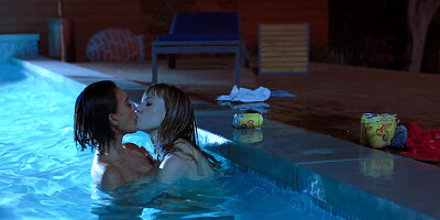 ...Lesbians vixens Janice Griffith and Ivy Wolfe licking passionately by the pool...