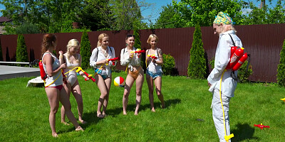 ...Five insatiable young babes get nicely fucked in the backyard...