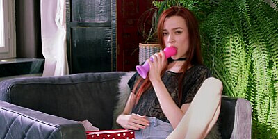 ULTRAFILMS Hot redhead Sherice fingering and riding a colorful toy on the table